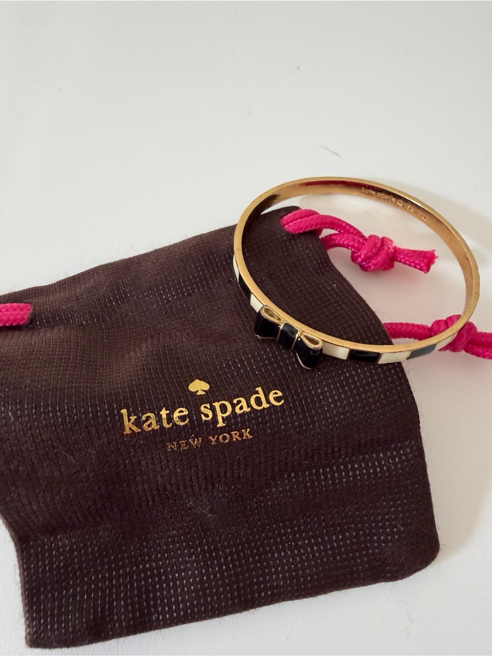 kate spade Gold Bangle Bracelet with Black and White Enamel Bow